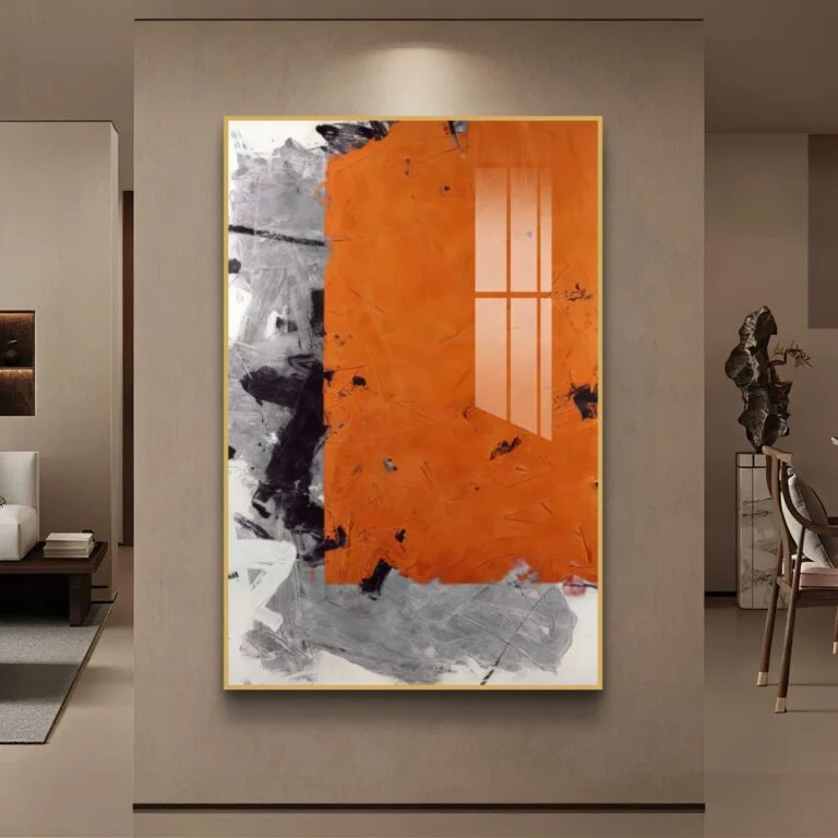 Modern abstract wall art with orange and gray tones in a luxury home setting.