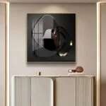 Modern abstract wall art with geometric shapes in a luxury interior setting.