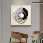Modern luxury wall art with circular design and gold accents in a stylish living room.