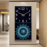 Modern Islamic wall clock with Arabic calligraphy and decorative accents.
