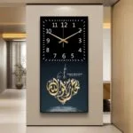 Modern Islamic wall clock with Arabic calligraphy and mosque design.
