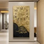 Luxury Islamic wall clock with Arabic calligraphy and gold accents in a modern hallway.