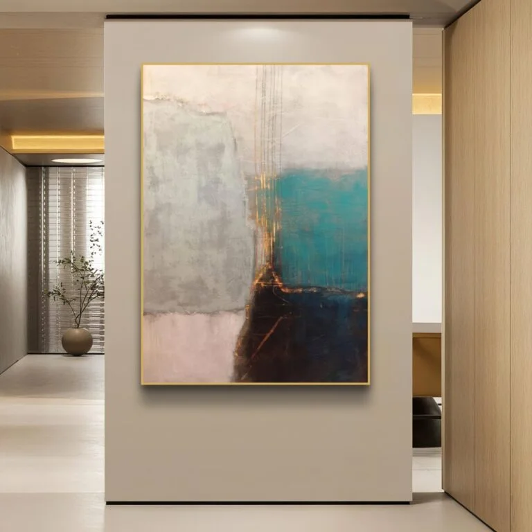 Modern abstract wall art with gold frame in a luxury home setting.