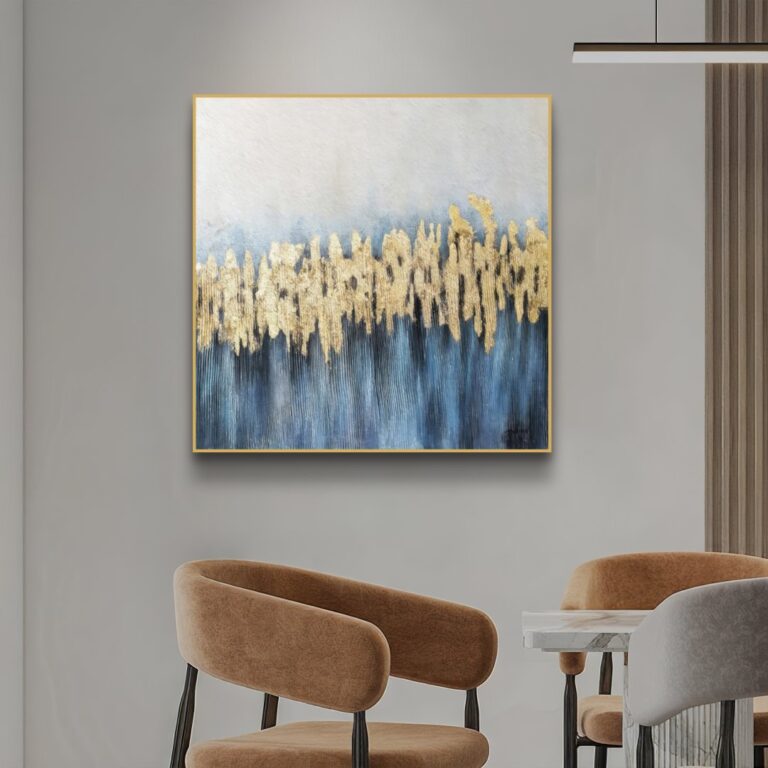 Modern luxury wall art with gold and blue abstract design in a living room setting.