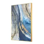 Modern abstract wall art with blue and gold tones in an aluminium frame.