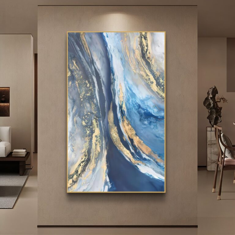 Modern abstract wall art with blue and gold tones in a luxury living room setting.