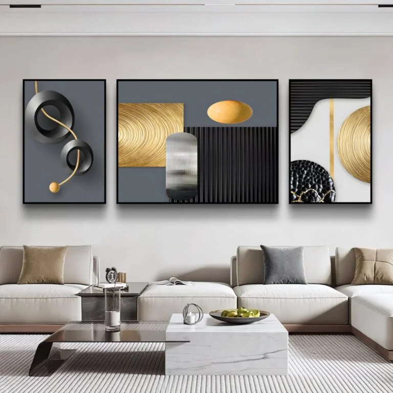 Modern luxury living room with abstract framed wall art and elegant decor.