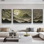 Modern framed wall art with mountain landscape in a luxury living room setting.