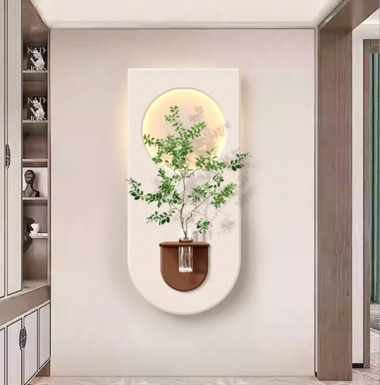Modern illuminated wall art with plant and LED lighting in a luxury home setting.