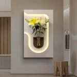 Illuminated wall art with flowers in a vase, modern home decor.