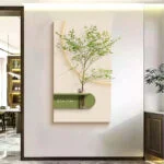Modern wall art with a minimalist tree design in a luxury home setting.