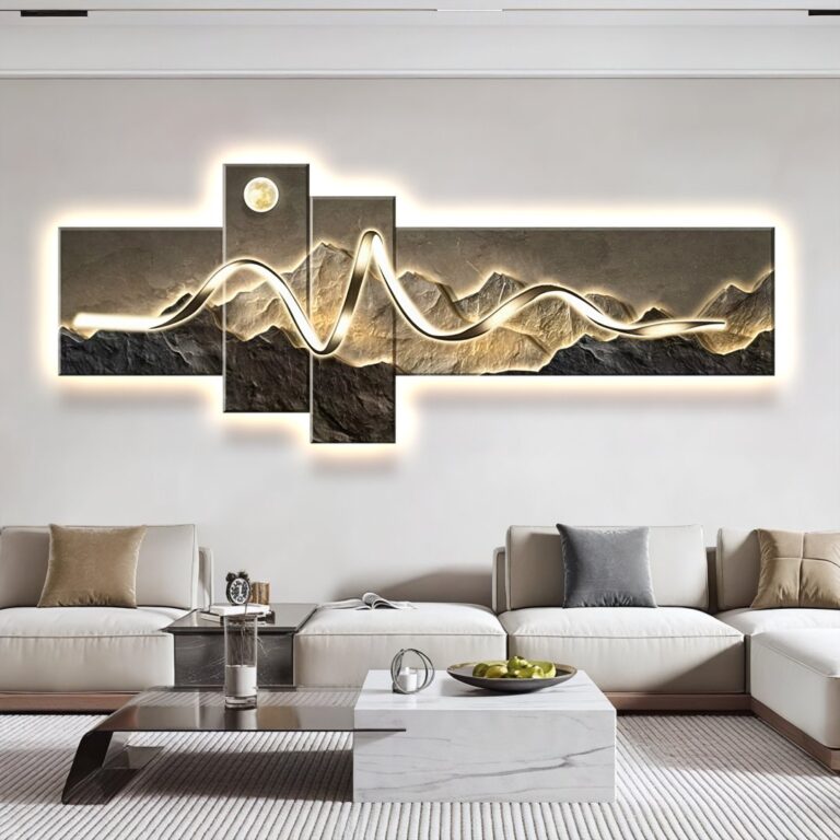 Modern illuminated wall art with mountain design in a luxury living room setting.