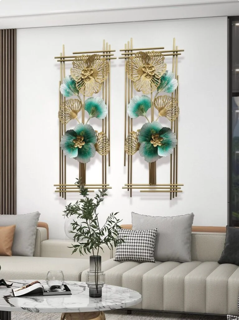 Modern luxury wall art with gold and teal floral design in a living room setting.