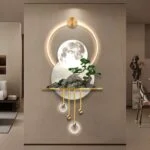 Modern illuminated wall art with circular LED design and nature elements.