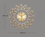 Gold and blue decorative wall clock with leaf design, modern home decor.