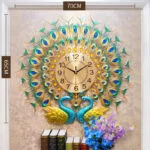 Luxury peacock-themed decorative wall clock with gold and blue accents, perfect for modern home decor.
