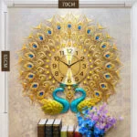 Luxury peacock-themed decorative wall clock with gold and blue accents, perfect for modern home decor.