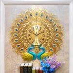 Luxury peacock-themed decorative wall clock with gold and blue accents, ideal for modern home decor.