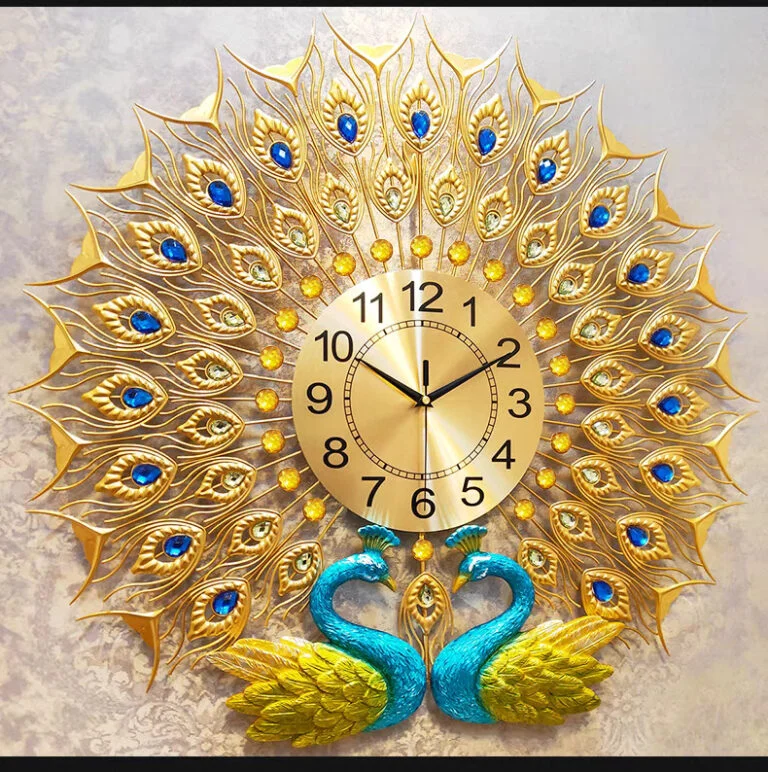 Luxury decorative wall clock with gold peacock feather design and blue accents.