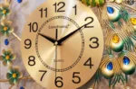 Luxury gold wall clock with floral and peacock feather design, perfect for modern home decor.