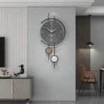 Modern luxury wall clock in a stylish living room setting with contemporary decor.