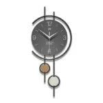 Modern decorative wall clock with geometric design and metal accents.