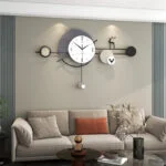 Modern decorative wall clock with geometric design in a stylish living room setting.