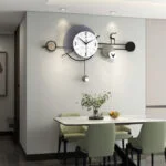Modern decorative wall clock with geometric design in a stylish dining room.