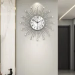 Modern luxury wall clock with crystal accents in a stylish hallway.