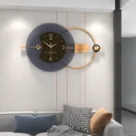 Modern luxury wall clock with geometric design in a stylish living room.
