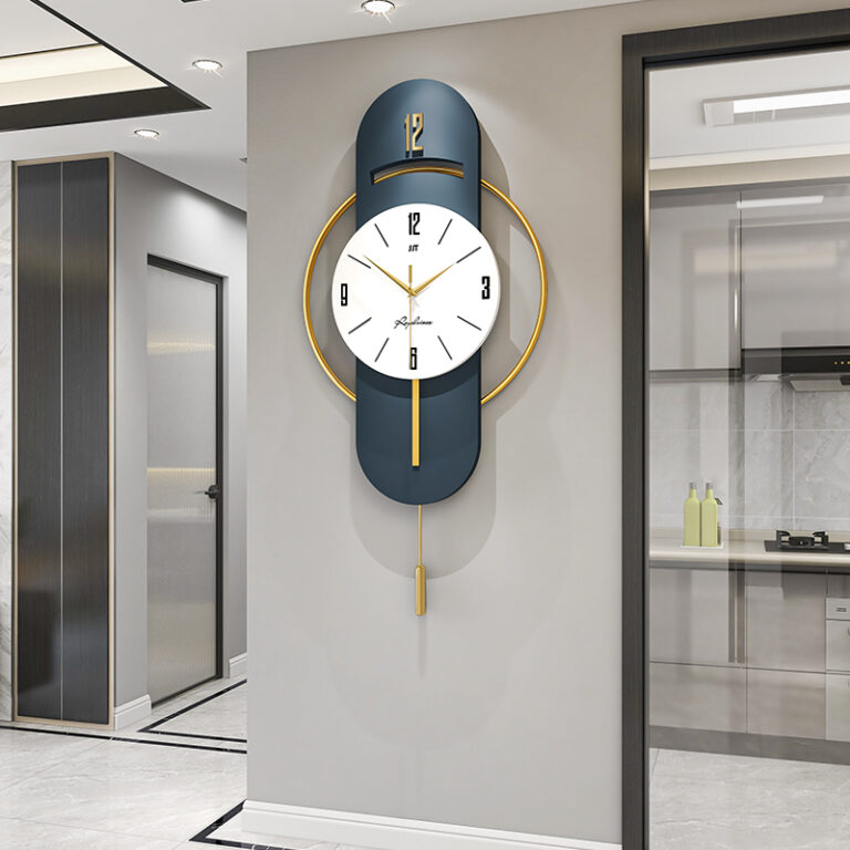 Modern luxury wall clock with gold accents in a contemporary home setting.