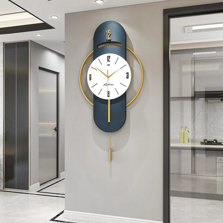 Modern luxury wall clock with gold accents in a contemporary home setting.