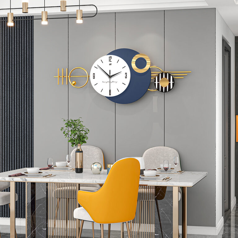Modern luxury wall clock with geometric design in a stylish dining room setting.