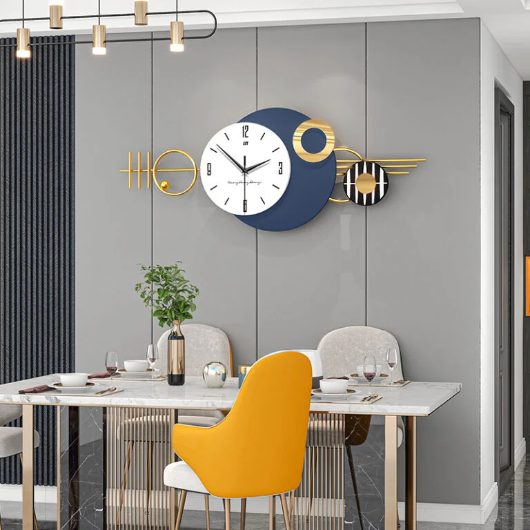 Modern luxury wall clock with geometric design in a stylish dining room setting.