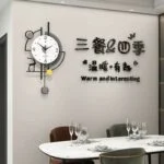 Modern decorative wall clock in a stylish dining room setting.