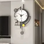 Modern decorative wall clock with geometric design and deer motif in a luxury home setting.