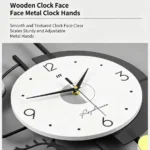 Modern wooden clock with metal hands and clear face, ideal for luxury home decor.