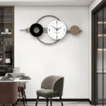 Modern decorative wall clock with geometric design in a luxury dining room setting.