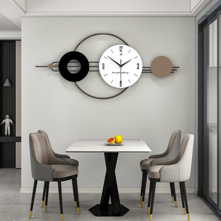Modern dining area with a decorative wall clock and elegant chairs.