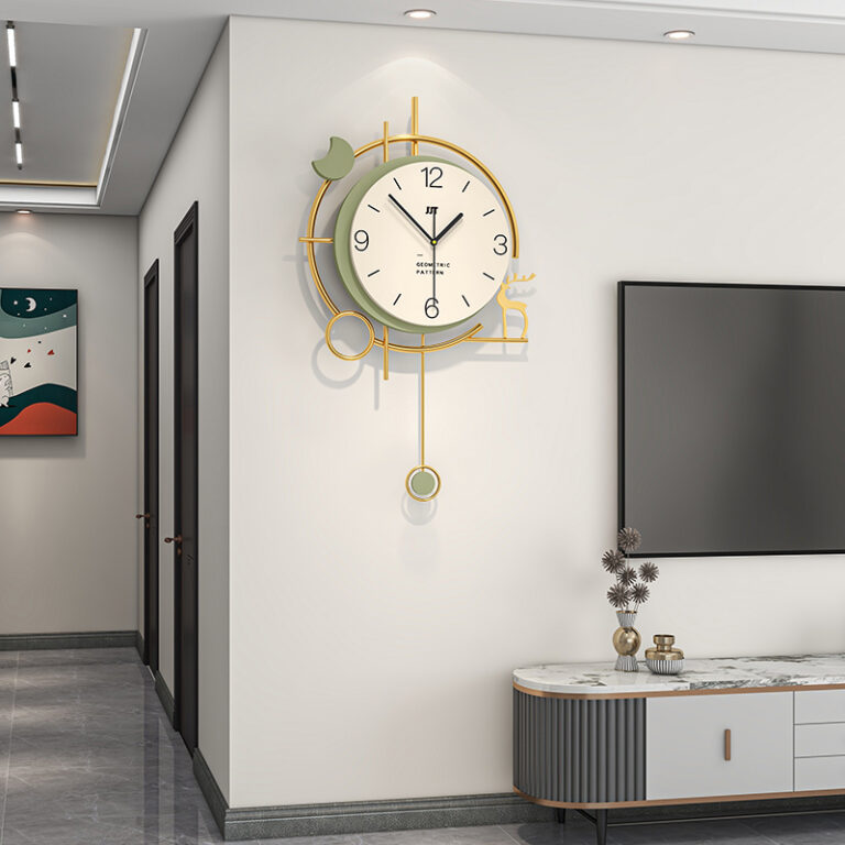 Modern luxury wall clock with gold accents in a stylish living room setting.