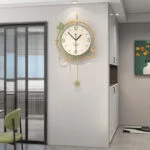 Modern luxury wall clock with gold accents in a stylish interior setting.