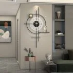Modern luxury wall clock with geometric design in a stylish living room setting.