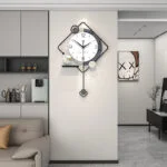 Modern decorative wall clock in a stylish living room setting.
