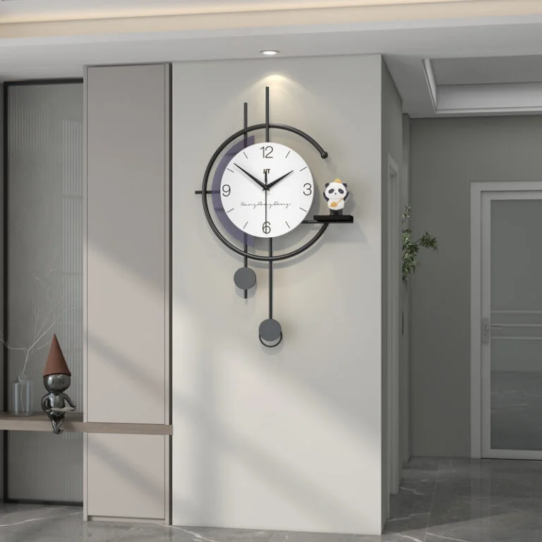 Modern luxury wall clock with pendulum in a stylish hallway setting.