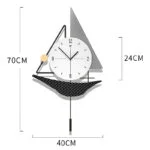 Modern decorative wall clock with geometric design and black and white accents.
