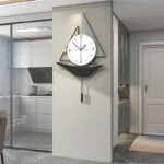 Modern decorative wall clock with geometric design in a contemporary home interior.