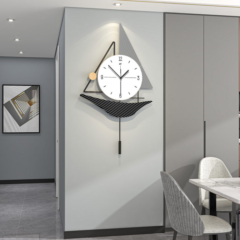 Modern wall clock with geometric design in a contemporary dining room setting.