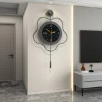 Modern luxury wall clock with unique design in a stylish living room setting.