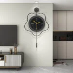 Modern luxury wall clock with unique design in a stylish living room setting.