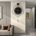 Modern luxury wall clock with unique design in a stylish living room setting.